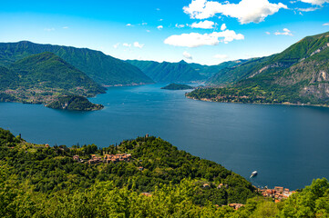 Fototapeta na wymiar Lake Como, Photographed by Perledo, showing Varenna, Bellagio, Castello di Vezio, and Punta Balbianello, on a spring day. 