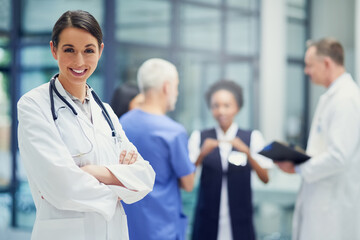 Health care, happiness and portrait of woman doctor with mockup, confident smile in hospital and leadership in medicine. Healthcare career, mock up and happy medical professional in lobby of clinic.