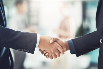Business people, handshake and meeting for hiring, partnership or deal in b2b agreement at office. Businessman shaking hands for recruitment or corporate growth in teamwork, welcome or introduction