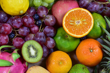 assorted fruits, top view healthy food concept Including high vitamin fruits, fresh fruits, tropical fruits