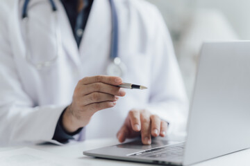 dentist and patient discussion about planned teeth treatment in dental clinic office room.