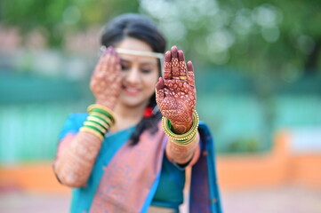 beautiful indian bride with henna hands. Bridal Henna Tattoo. Mehendi art. Body Art. Indian Wedding...