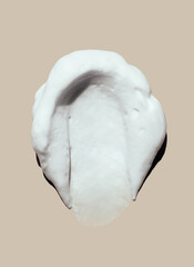 texture foam mousse foam cosmetic smear sample on beige background