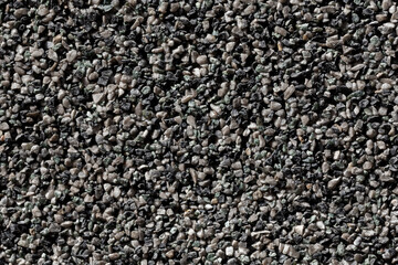 Crushed granite stones wall - close up