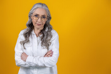 Gray-haired beautiful woman in eyeglasses