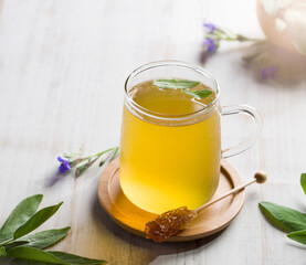 A glass of sage. Salvia herb. Herbal teas. Hot drinks for health and diet.