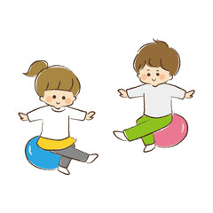 バランスボールに乗っている男児と女児