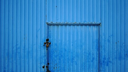 industrial blue door as background