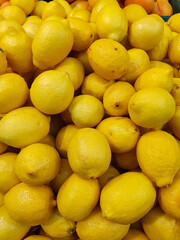 Colorful Display Of Lemons at fruit and vegetables street Market