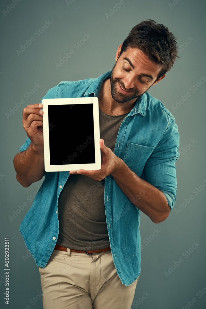 Poster man, tablet and mockup screen for advertising, marketing or branding against a grey studio backgroun