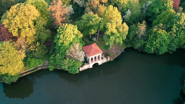 Birkenhead Park, upon which Central Park NY is based - Aerial drone at dawn, slow dronie from Roman Pavilion, park reveal - May 23