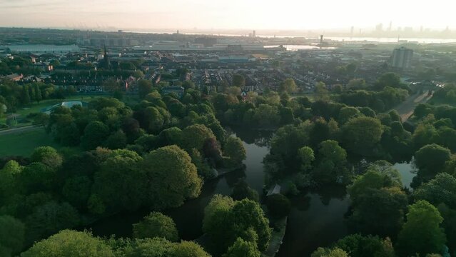 Birkenhead Park, upon which Central Park NY is based - Aerial drone at dawn, anti-clockwise rotate, Roman Pavilion reveal - May 23
