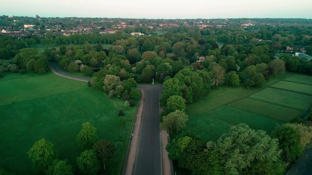 Birkenhead Park, upon which Central Park NY is based - Aerial drone at dawn, Grand Entrance approach and lake flyover - May 23