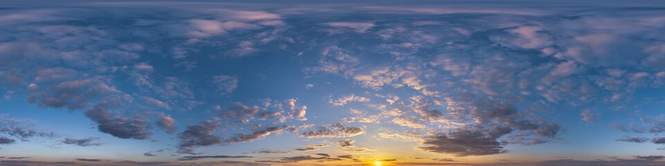 sunset skydome with evening clouds as seamless hdri 360 panorama view in spherical equirectangular format for use in 3d graphics or game development as sky dome or edit drone shot