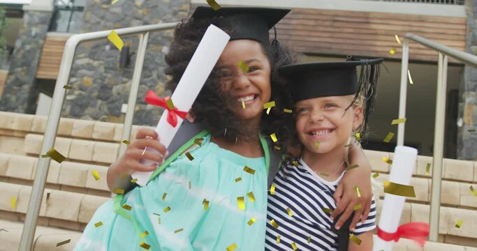 Animation of gold confetti over happy diverse schoolgirls with diplomas and mortar boards embracing
