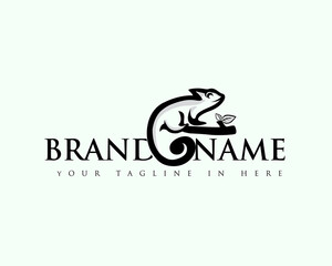 chameleon drawn art patch at branch logo design template illustration inspiration