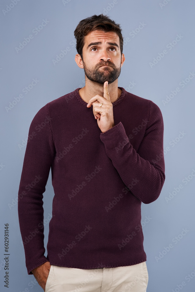 Poster doubt, thinking and thoughtful man in studio with unsure, uncertain and ideas on gray background. wo