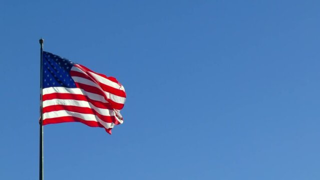 flag of the United States of America waving on a sunny day