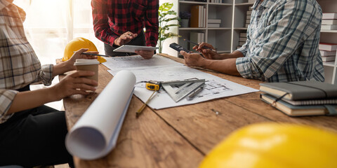 engineer working in office with blueprints, inspection in workplace for architectural plan, construction project ,Business construction