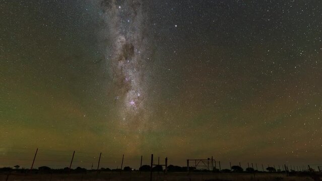 Milky Way Galaxy timelapse over the Namibian savanna, taken from Tivoli astrofarm. Visible southern sky with the Milky Way and Large and Small Magellanic Clouds.