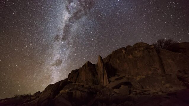 Milky Way timelapse taken over rocks formation in Namib Desert.