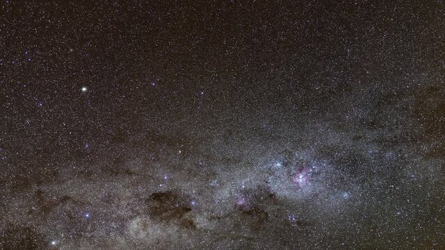 Captivating footage of the Milky Way galaxy shot in Namibia with tracking with visible Crux constellation and Coalsack Nebula.