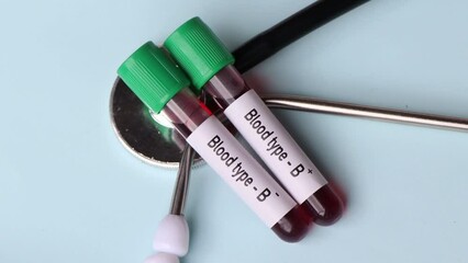 Blood type B Rh positive and negative test, blood sample to analyze in the laboratory, blood in test tube