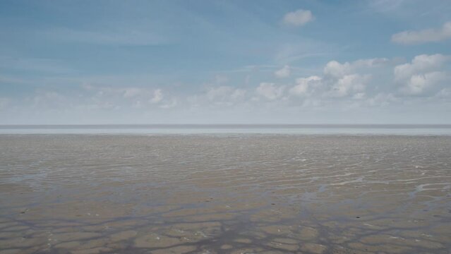 Aerial of a long sand bank at the Wadden Sea in the Netherlands