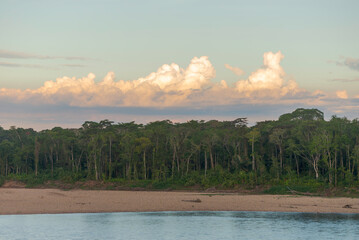 Peruvian Amazon River and Forest with a big cumulonimbus clouds