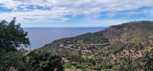 Fototapeta na wymiar hike from Esporles to Banyalbufar showcases the natural beauty and charm of Mallorca's western coastline. This scenic trail takes you through picturesque landscapes, offering breathtaking views along