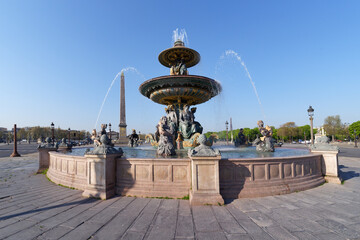 Fototapeta na wymiar Fountain on Place de la Concorde in the 8th arrondissement of Paris