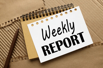 Weekly Report text on a sheet of banking, finance and investment paper