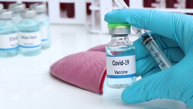 Covid-19 vaccine in a vial, immunization and treatment of infection, vaccine used for disease prevention
