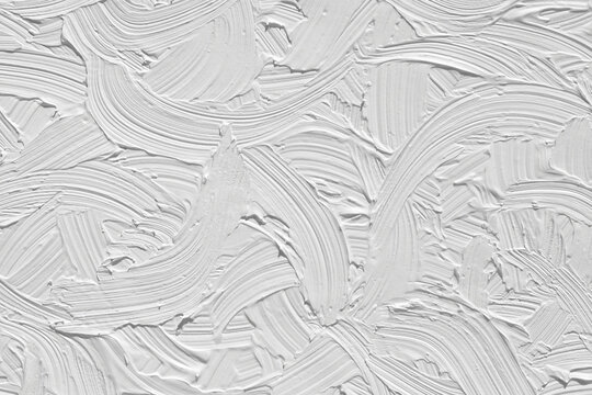Texture of white paint with artist's brush strokes, template for wallpaper and cover. Gray pattern of abstract design 3d wall in trendy style.