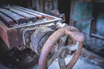 Old rusty machines in an abandoned factory.