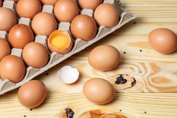 Fresh eggs. Eggs on vintage wooden table in breakfast.
