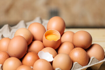 Fresh eggs. Eggs on vintage wooden table in breakfast.