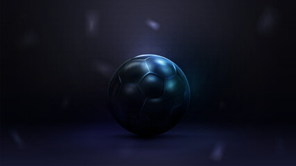 Black and blue football ball on dark background