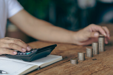 Concepts of financial accounting management in the future, income and expenses, savings and investment management concepts. Key things to consider when planning with stacks of coins