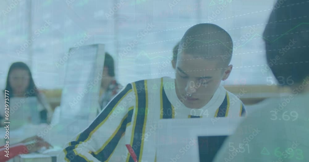 Canvas Prints Animation of stock market data processing over biracial man taking notes at office