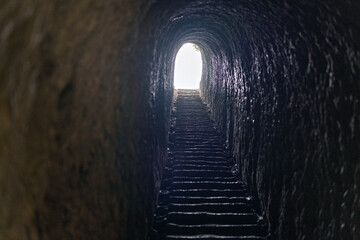 narrow tunnel with access to Tunnel Beach, Dunedin, New Zealand