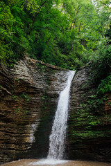Fototapeta na wymiar a waterfall nature travel hiking green forest