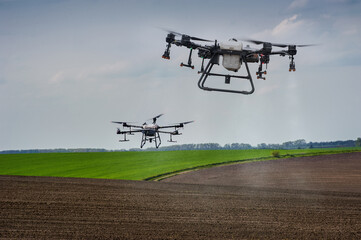 drone sprayers apply fertilizers to fields, precision farming, the latest agriculture