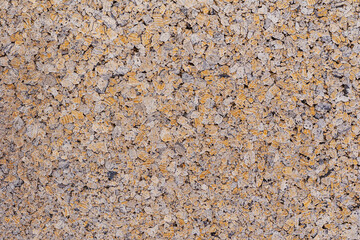 Wall decorated with abstract tiles pieces close-up. Abstract background