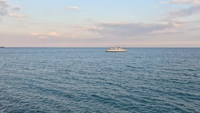 Boat with tourists is sailing on the Mediterranean