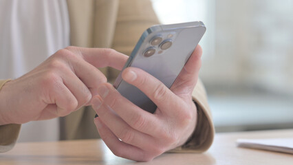 Close up of Male Hand Using Smartphone