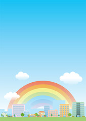 虹と青空を背景にした街並み