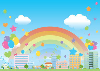 虹のかかる青空に風船が飛んでいる賑やかな街並み