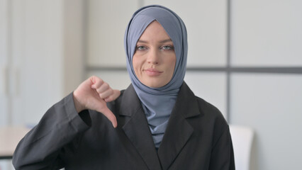 Portrait of Muslim Businesswoman Doing Thumbs Down