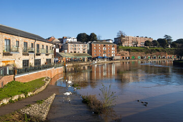 Obraz premium Skyline of the historic quayside of Exeter in Devon at sunrise, UK